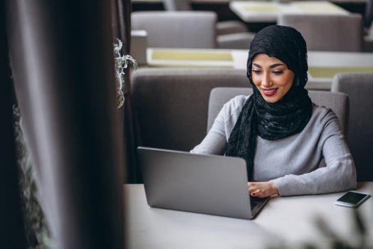 arabian-woman-hijab-inside-cafe-working-laptop